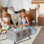 organized family home with kids tidying playroom