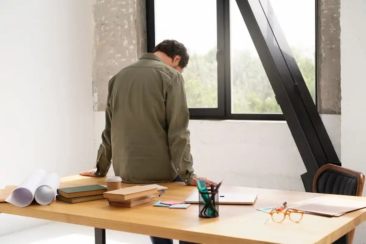 focused person working at tidy desk
