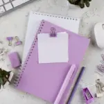 organized work and study desk with planner and laptop