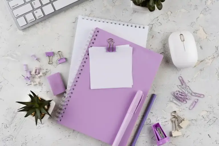 organized work and study desk with planner and laptop