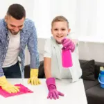 busy family cleaning home with kids
