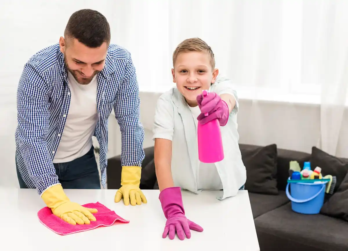 busy family cleaning home with kids