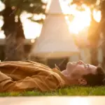 relaxed person breathing outside natural light