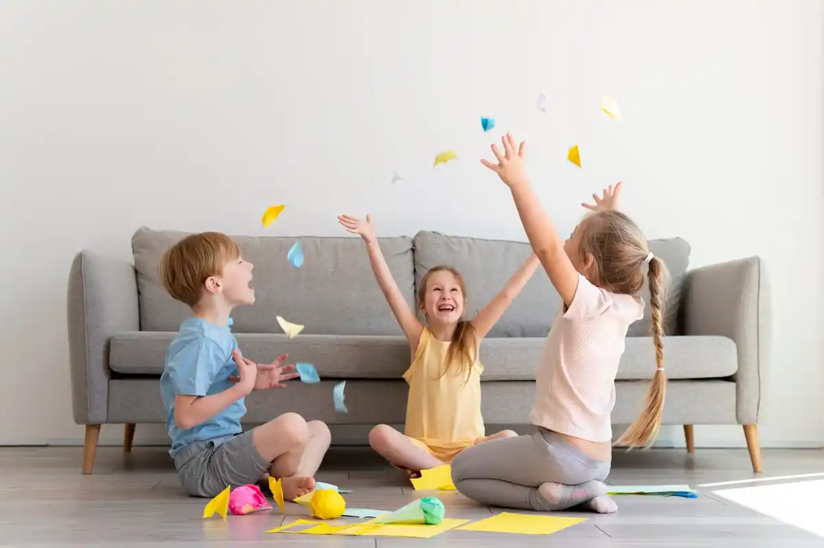 messy kids playing at home with toys chaos