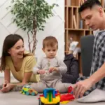 happy family at home with kids playing