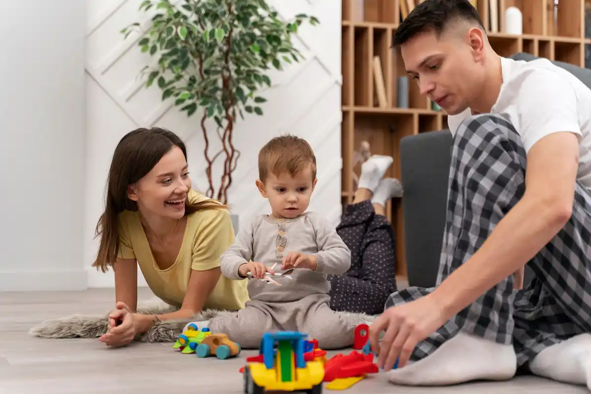 happy family at home with kids playing