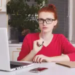 focused working at desk laptop