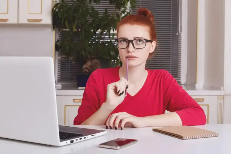 focused working at desk laptop
